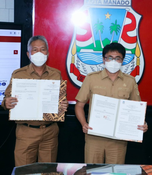 Bupati Franky Donny Wongkar melakukan MoU dengan Pemerintah Kota Manado, Walikota Manado Andrei Angouw
